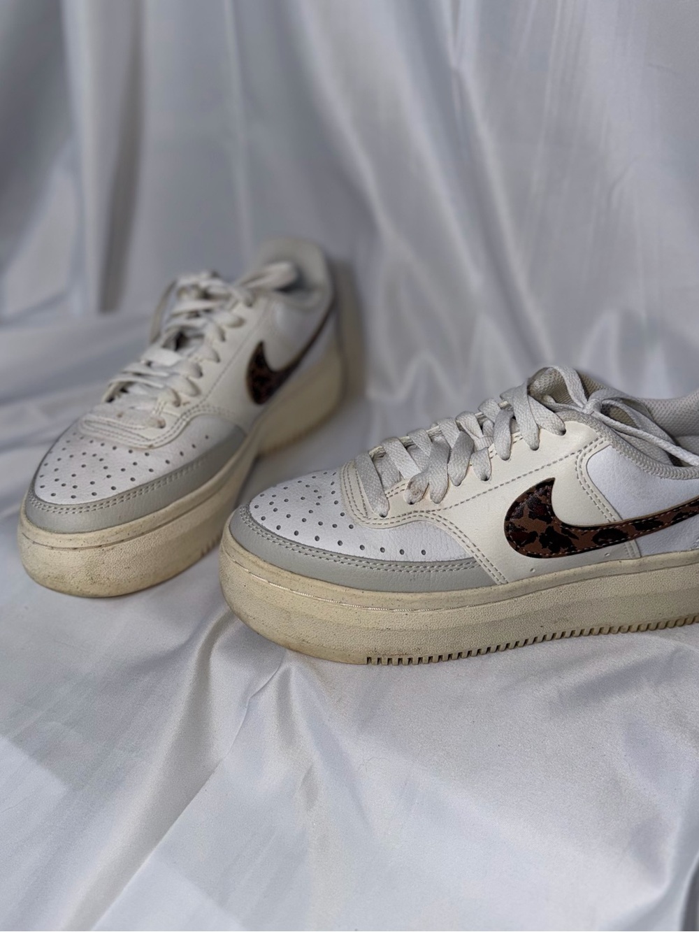 Nike White Leather Sneakers with Brown Patterned Swoosh